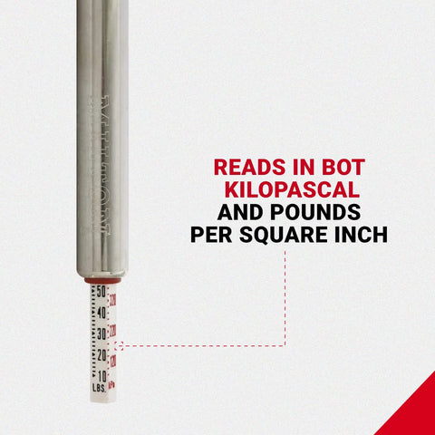 Milton S-928 tire pencil pressure gauge (front view) with built-in deflator valve, white body, PSI/kPa scale