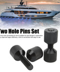 Two Hole Pipe Flange Alignment Pins In Anodized Black Aluminum, shown with a yacht in the background.