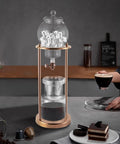 Chill Mode Ice Cold Brew Dripper Coffee Maker Featuring 600ml Borosilicate Glass And Stainless Steel Slow Drip Extraction System, showcasing iced coffee preparation.