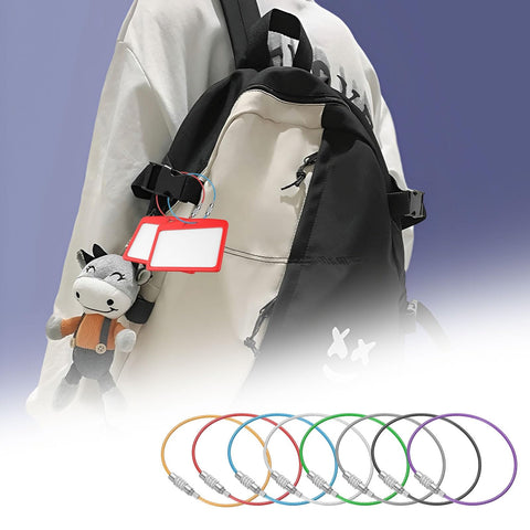 Backpack with colorful loop from 50 Pack Wire Keychain Cables 12 Inch Plastic Coated 1.5mm Stainless Steel Key Ring Loops For Hanging Luggage Tags And ID Tags And Travel Accessories Silver attached to a luggage tag.