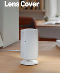 Wireless Indoor Security Camera With Retinal 2K Video And 6X Optical Zoom For Crisp True Color Footage Day Or Night Straight Up Solid Home Safety Monitor Black on wooden table.