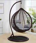Round Rubber Floor Pad For Recliners, Non Slip Floor Protector Mat beneath a hanging egg chair in a modern room setting