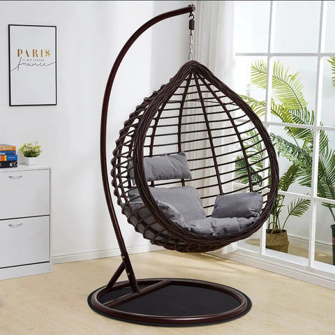 Round Rubber Floor Pad For Recliners, Non Slip Floor Protector Mat beneath a hanging egg chair in a modern room setting