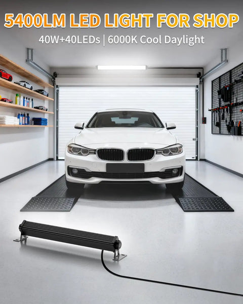 40W LED Shop Lights With 6 Foot Cord And Easy Switch 5400 Lumens Daylight 6000K Crankin Bright Plug In Garage Light For Garage Workbench And Warehouse Energy Saving Up To 80 Percent Wide 120 Degree Beam 2 Pack illuminating a garage with a car inside.