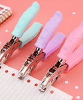 Colorful blue metal hole punch with soft grip handle for DIY crafts and scrapbooking, cuts clean 1/4 inch holes, punches up to 5 sheets.