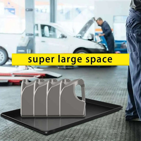 Three Piece Extra Large Heavy Duty Oil Drip Pan Set 35.4 by 24 by 1.6 Inches in garage with oil containers