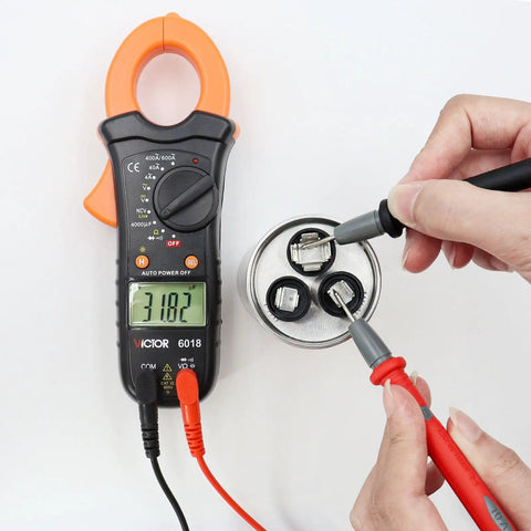 Oval Run Capacitor 30/5MFD 370V 440VAC CBB65S For Air Conditioners And Condensers 50/60Hz Heat Pumps on multimeter test