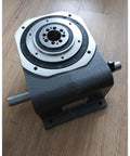 Top Shelf Rotary Actuator Cam Indexer With Hella Precise Indexing And A Smooth Quiet Ride For Heavy Duty Automation Assembly And Printing Factory Floor, view of the top with circular plate.
