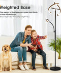 Two In One Smart Remote And Touch Control LED Floor Lamp With Reading Light shown in living room with family and dog.