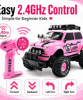 Pink RC Monster Truck For Girls With Two Rechargeable Batteries, 2.4GHz Easy Control, Kid Friendly Remote Car Toy displayed with remote