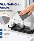 Heavy Duty Lever Action Paper Punch with soft-grip handle for comfortable use and 50 sheet capacity on a workspace