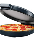 All In One Kitchen Powerhouse Everything Maker And Pizza Oven on countertop with 1440W power, 12 inch nonstick plates, making pizza