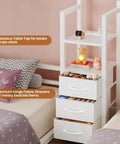 White bedside storage with drawers and table top, part of Triple Bunk Bed Space-Saving With House Shape For Kids