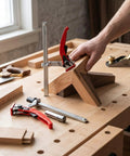 Woodworker using Two Pack Welding Table Clamps For Three Quarter Inch Dog Holes Heavy Duty Workbench Clamps on wooden project