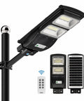 Upgraded Solar Street Light 12000 Lumens Super Bright Outdoor With 10000mAh Battery And 120 LEDs Remote Control shown mounted and detached