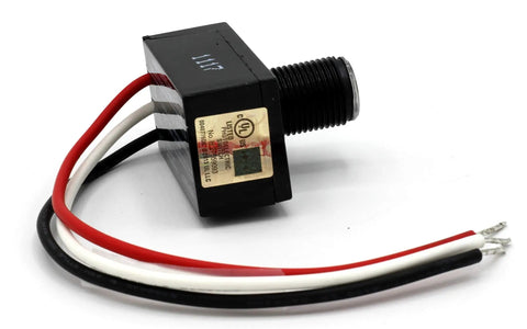 Close-up of Two Pack Outdoor Dusk To Dawn Light Sensor Controllers with wires and label visible, designed for home safety