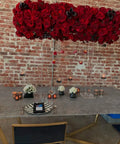 Table setting with red rose centerpiece against brick wall, showcasing Grey Soapstone Kitchen Countertop Backsplash Peel And Stick.