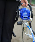 Pro Level Airless Paint Sprayer, 3000 Psi Electric Power Tool With Low Overspray, Heavy Duty Spray Gun Kit in hand.