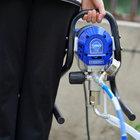 Pro Level Airless Paint Sprayer, 3000 Psi Electric Power Tool With Low Overspray, Heavy Duty Spray Gun Kit in hand.