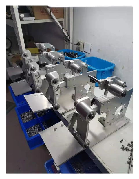 Badass 750W Brushless Belt Grinder And Polishing Workhorse With Ironclad Precision Steel Chassis and parts on a table.
