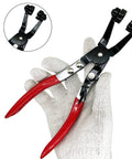 Three Piece Hose Clamp Pliers Kit With Long Reach Wire Spring Clamp Remover in hand, red handles, black metal jaws, close-up view.