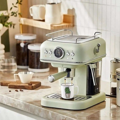 Retro-style espresso machine with a cactus print cup underneath, part of the Four Pack Ceramic Demitasse Espresso Cups set
