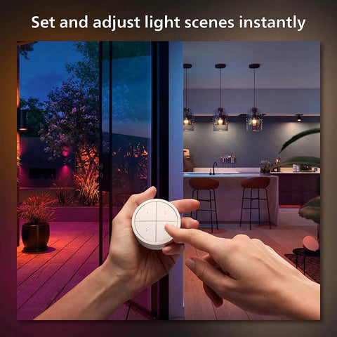 Person adjusting Wall Tap Dial Dimmer Switch For Smart Lights White 1 Pack Easy Wireless Setup No Wiring Required Requires Bridge