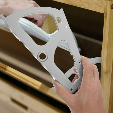 Stainless steel drawer hinge plate; close-up of installation on a wooden cabinet frame.