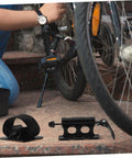 Heavy Duty Aluminum Roof Bike Mount With Quick Release Front Fork Clamp And Retaining Clip in use with bicycle