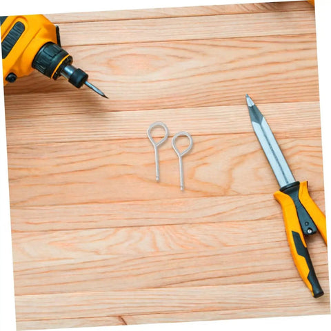 Fire Extinguisher Pull Pins Kit 20 Replacement Safety Lock Pins For Multiple Models on wooden surface with drill and screwdriver