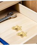 Stylish Vintage Zinc Alloy Duckbill Toggle Latch Set With All Mounting Hardware For Upgrading Wooden Jewelry Boxes And Cabinets In Super Cool Golden Finish You Will Love mounted in drawer with wrench.