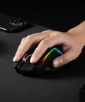 Ultra Responsive Wireless Gaming Mouse For Serious Gamers With 10000 DPI Onboard Settings And Eight Macro Buttons Rapid Fire Key And RGB Backlight For PC Mac And Laptop Gaming in use on a desk