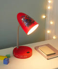 Spiderman Switch Operated LED Desk Lamp With USB Charging Outlet for Kids on desk with red base and comic graphics shade