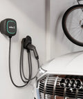 Premium Wall Mounted Level 2 Ev Charger Delivering 48 Amps For Heavy Duty Electric Whip Charging And Up To 45 Miles Range Per Hour Universal J1772 Standard Plug And Play Design Perfect For Garage Or Driveway Zap Juice Installations with charging cable mounted in garage.
