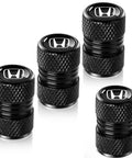 Honda Aluminum Alloy Tire Valve Stem Caps 4 Piece Set Black For Accord Civic CR-V Pilot EX EX-L Cars displayed in four pieces