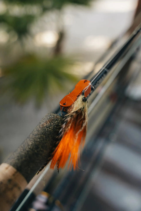 Close-up of fishing lure attached to Mag Grab Rod Rack Magnetic Fishing Rod Holder Black for quick-access secure storage.
