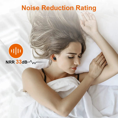 Woman sleeping with reusable silicone ear plugs for sleeping and noise reduction 33 dB snoring travel work study and concerts.
