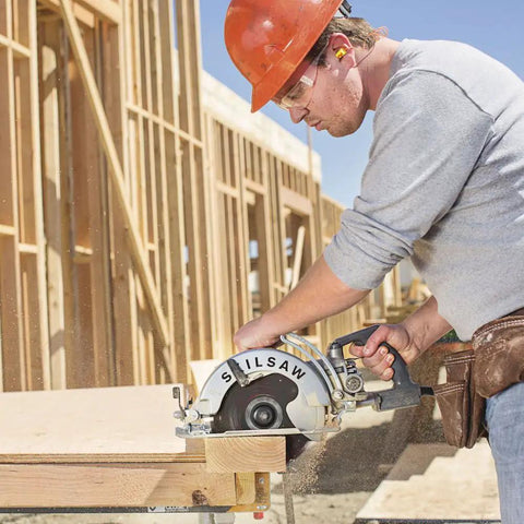 Professional Grade Hardcore 15 Amp Worm Drive Circular Saw With 8 1/4 Inch Blade cutting wood at construction site.