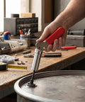 Heavy Duty Steel Drum Fastener Plunger Tool Fits Size Six Components With 0.158 Inch Inner Diameter in use on a steel drum.