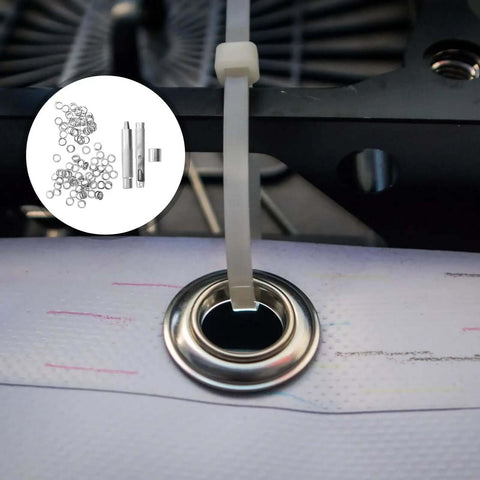 Close-up of 10mm Steel Eyelet Punch Tool And Base Kit With 100 Silver Eyelets installed on fabric, showing a secure grommet.