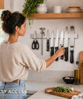 Woman using 16 Inch Stainless Steel Magnetic Knife Bar for Kitchen Storage and Home Organization, Built To Hold Knives And Gear