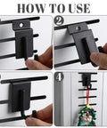 How to install 25 Pack J Shaped Slatwall Hooks And Hangers Heavy Duty Slatwall Accessories for panels, shown in use.