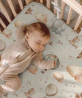 Sleeping baby on Balloon Transportation Pattern Baby Crib Sheets For Unisex Nursery Decor Featuring Balloons Clouds And Birds Fitted Sheet 28x52
