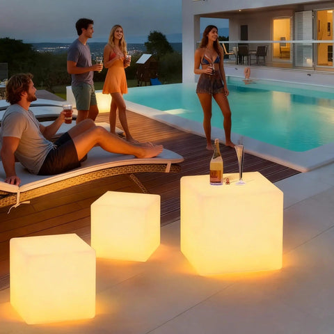 Rechargeable LED Cube Chair Light With Remote, 16 Inch Glow Cube Seat Doubles As Waterproof Cube Table by poolside at night