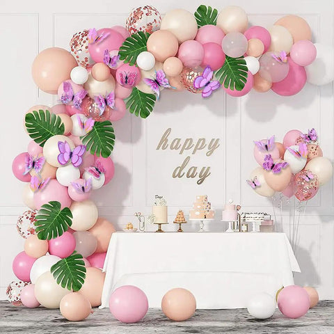 Pink 24 Piece 3D Butterfly Wall Decor Set With Removable Decals For Girls Room And Birthday Parties featuring balloons and table.