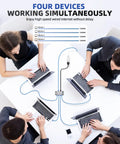4 Port Gigabit Ethernet Splitter Powered Network Switch With Wall Mount Ears connecting four laptops for fast internet in an office