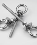 Eight Pack M8 Eye Bolts With Nuts And Washers For Heavy Duty Lifting And Tie Downs Five Sixteenth Inch Diameter Three Inch Long Stainless Steel Construction Includes Spring Washers, four bolts laid flat