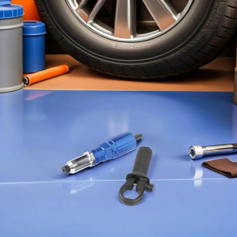 Super Cool Electric Rivet Gun Kit With Pro Aluminum Conversion Head And Ergonomic Grip Makes Fast Work Of Metal Auto And Furniture Assembly Jobs In Style blue aluminum drill rivet adapter with black grip beside car wheel