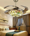 42 Inch Ceiling Fan With Light And Remote Featuring Four Slick Retractable Tiffany Chandelier Blades in a stylish bedroom setting.