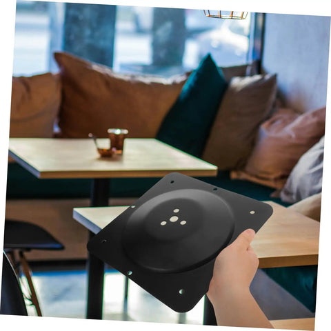 Hand holding Solid As A Rock Heavy Duty Replacement Attachment Plates For Sofa Couch And Table Legs Sturdy Furniture Mounting Brackets.